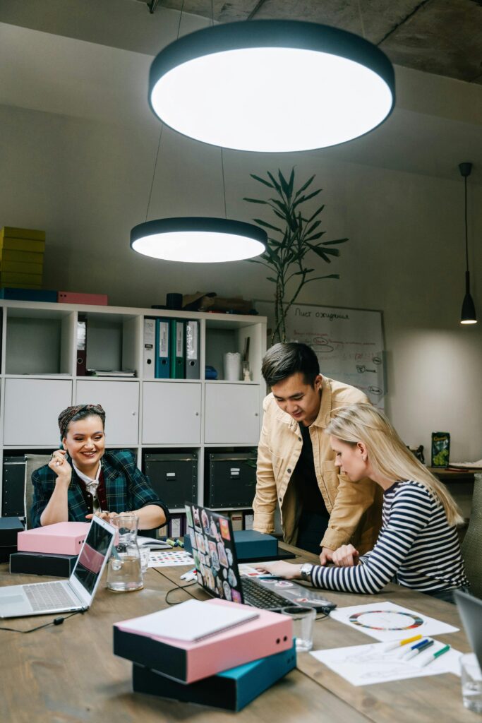 A team works together on a project in a modern office, fostering collaboration and teamwork.